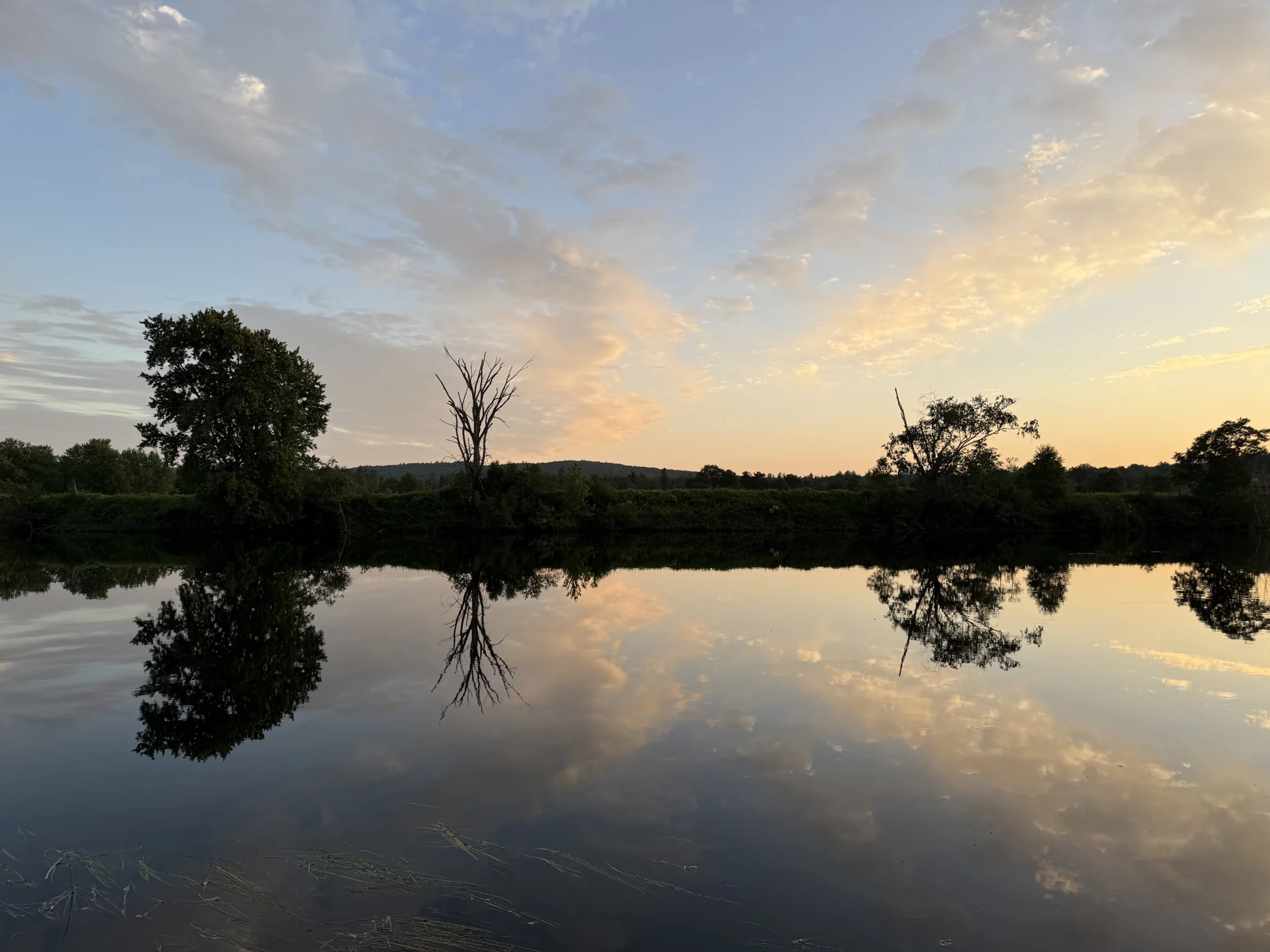 Sunset reflected across the Androscoggin, from Erica’s existing North Country photographs